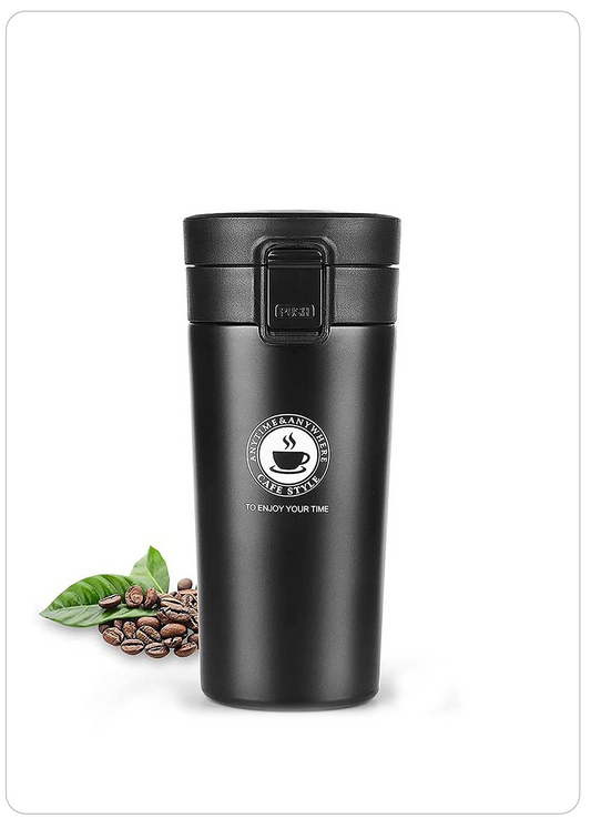 A matte black insulated travel tumbler with a flip-top lid, shown on a white background with coffee beans and green leaves as props. The tumbler features a silver coffee cup logo and the text 'COFFEE FOR LIFE' and 'TO ENJOY YOUR TIME'.